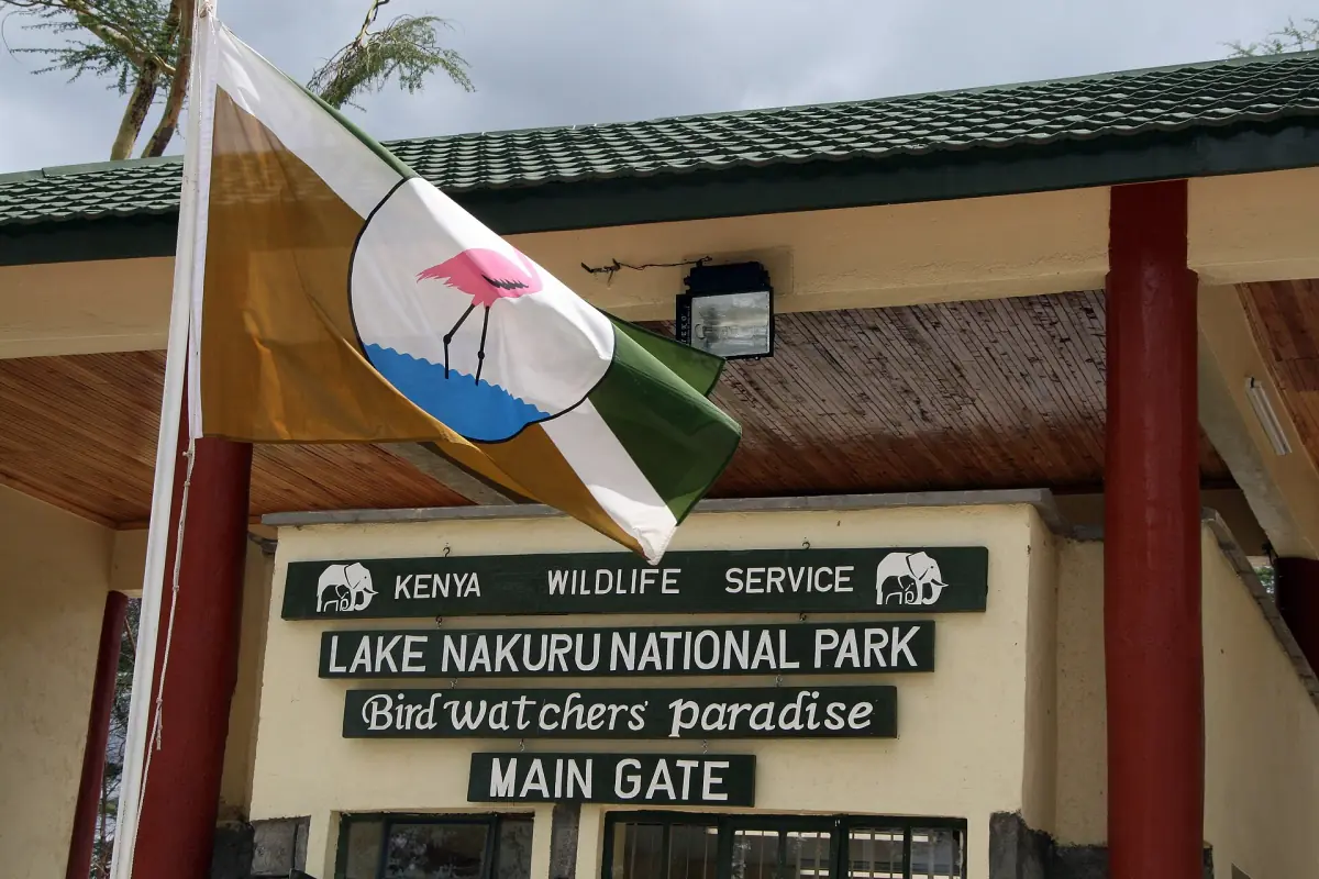 Main gate building of Lake Nakuru National Park with flag